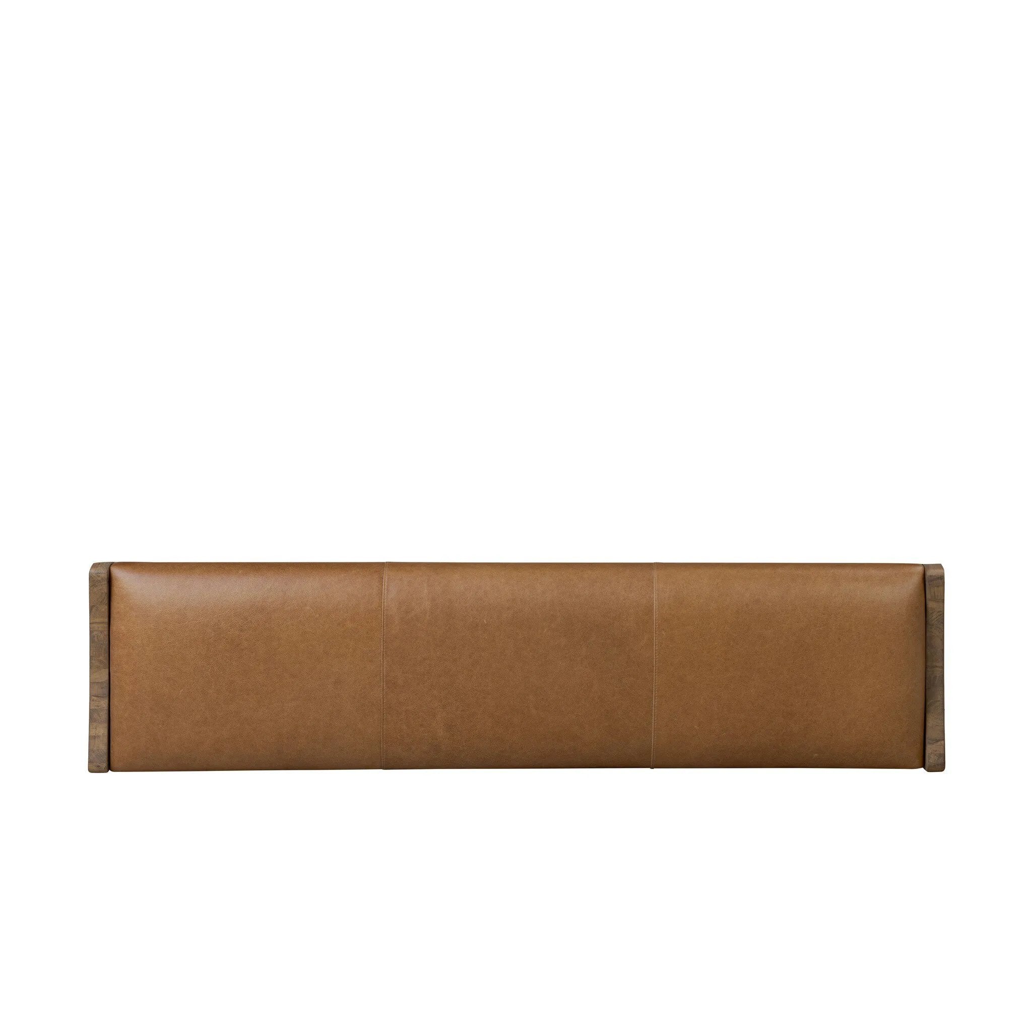 Top-grain leather and worn, solid oak fuse for a substantial, streamlined bench inspired by Nordic Minimalism Amethyst Home provides interior design, new home construction design consulting, vintage area rugs, and lighting in the Scottsdale metro area.