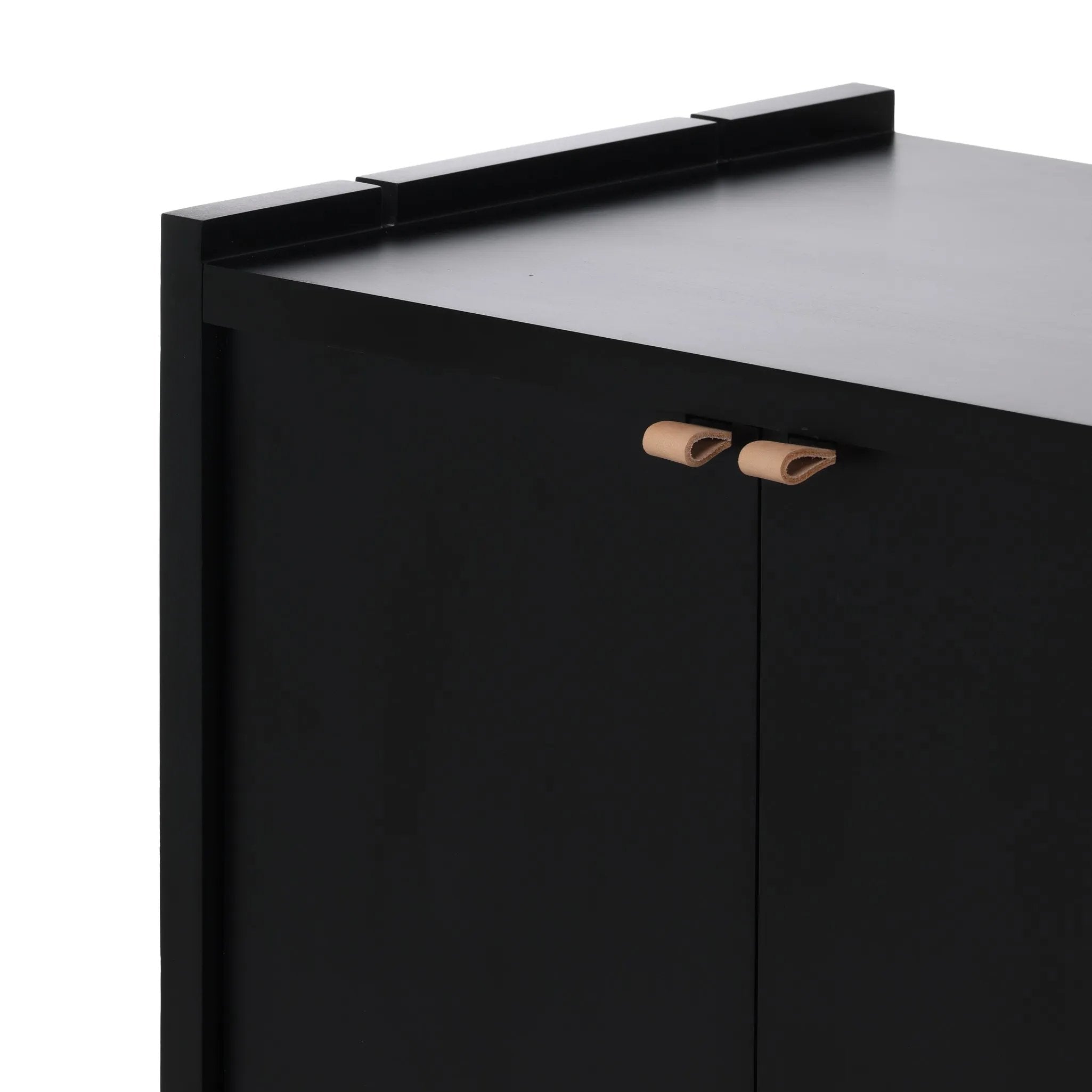 Featuring Etro Black Wash Poplar Media Console by Four Hands at Amethyst Home. Inspired by retro European design, a character-rich media console is made from black-finished poplar, with mortise and tenon joinery spanning its sides. Door pulls of top-grain leather add a textural finishing touch, while three rear cutouts keep cords out of sight.Overall Dimen. Amethyst Home provides interior design, new home construction design consulting, vintage area rugs, and lighting in the Alpharetta metro area.