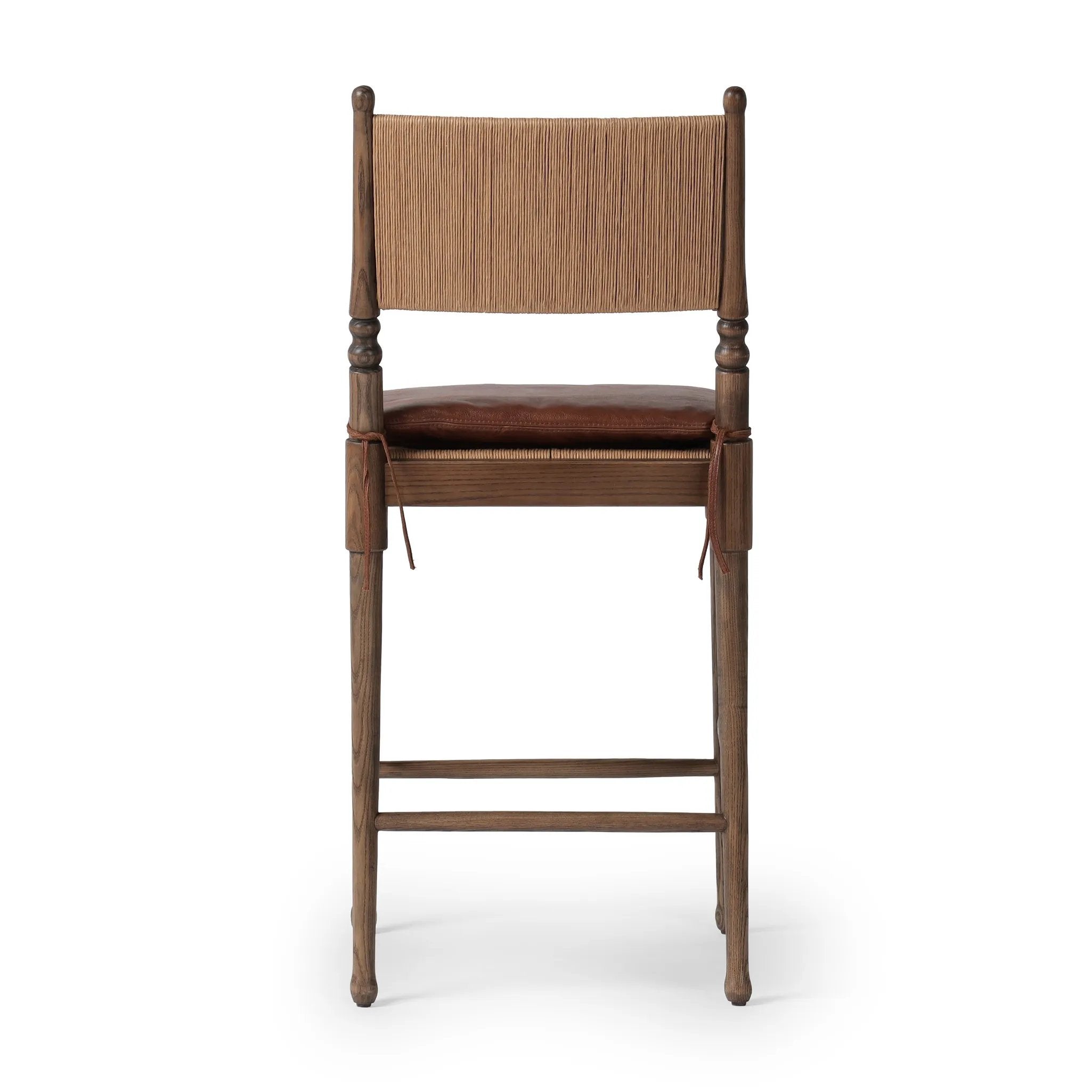 Classic meets current. Simplified turn shaping meets subtly curved legs to elevate a clean, traditional frame of walnut-finished solid ash. A brown top-grain leather cushion complements a back rest of textural paper cord. A design collaboration by Amber Lewis and Four Hands. Amethyst Home provides interior design, new home construction design consulting, vintage area rugs, and lighting in the Nashville metro area.