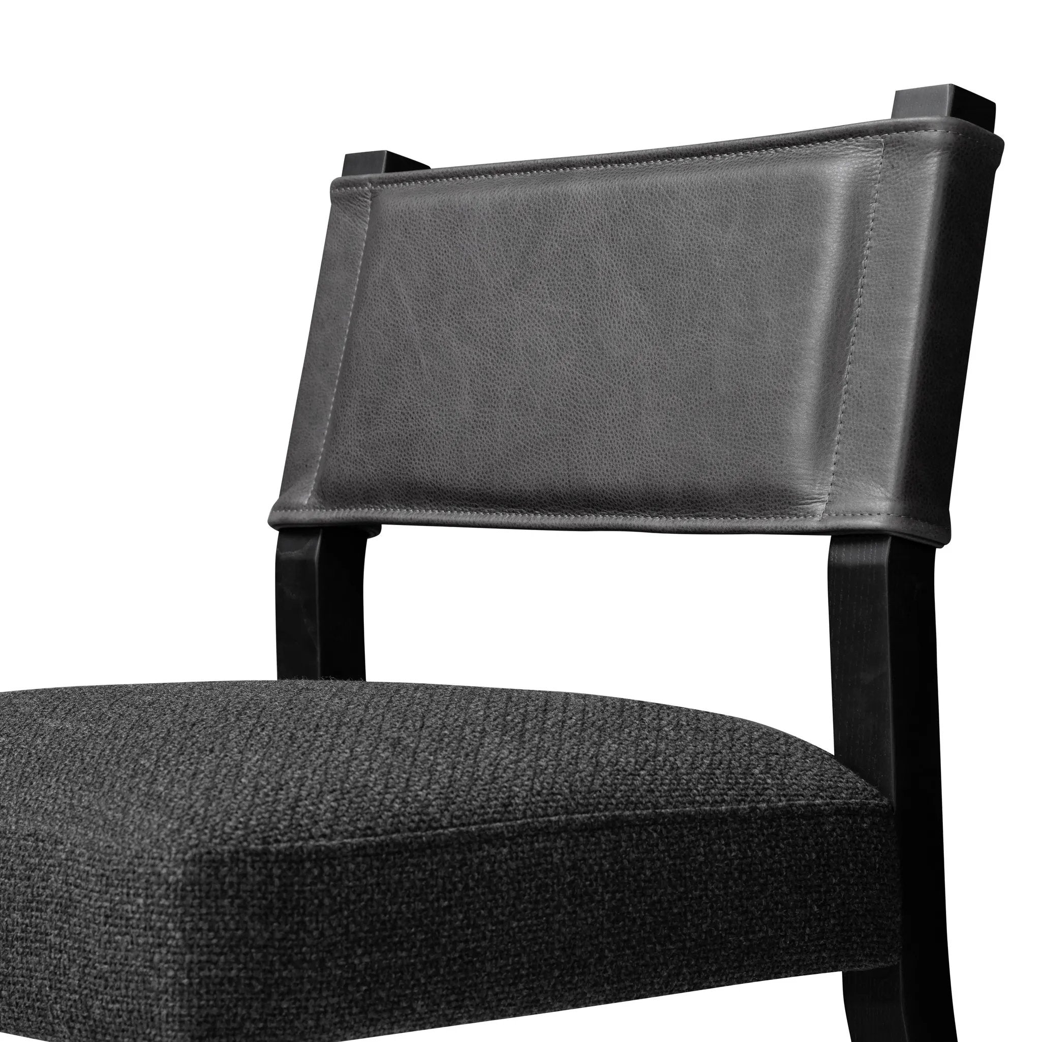 Featuring Ferris Gibson Black Dining Chair by Four Hands at Amethyst Home. Mixed materials at their finest. Black ash forms a slight, simple frame for squared seating of neutral performance-grade upholstery. Black top-grain leather backing takes this modern-minded dining chair to the next level.Overall Dimensions: 20.00"w x 22.00"d x 32.00"hWeight : 16.53 l. Amethyst Home provides interior design, new home construction design consulting, vintage area rugs, and lighting in the Nashville metro area.