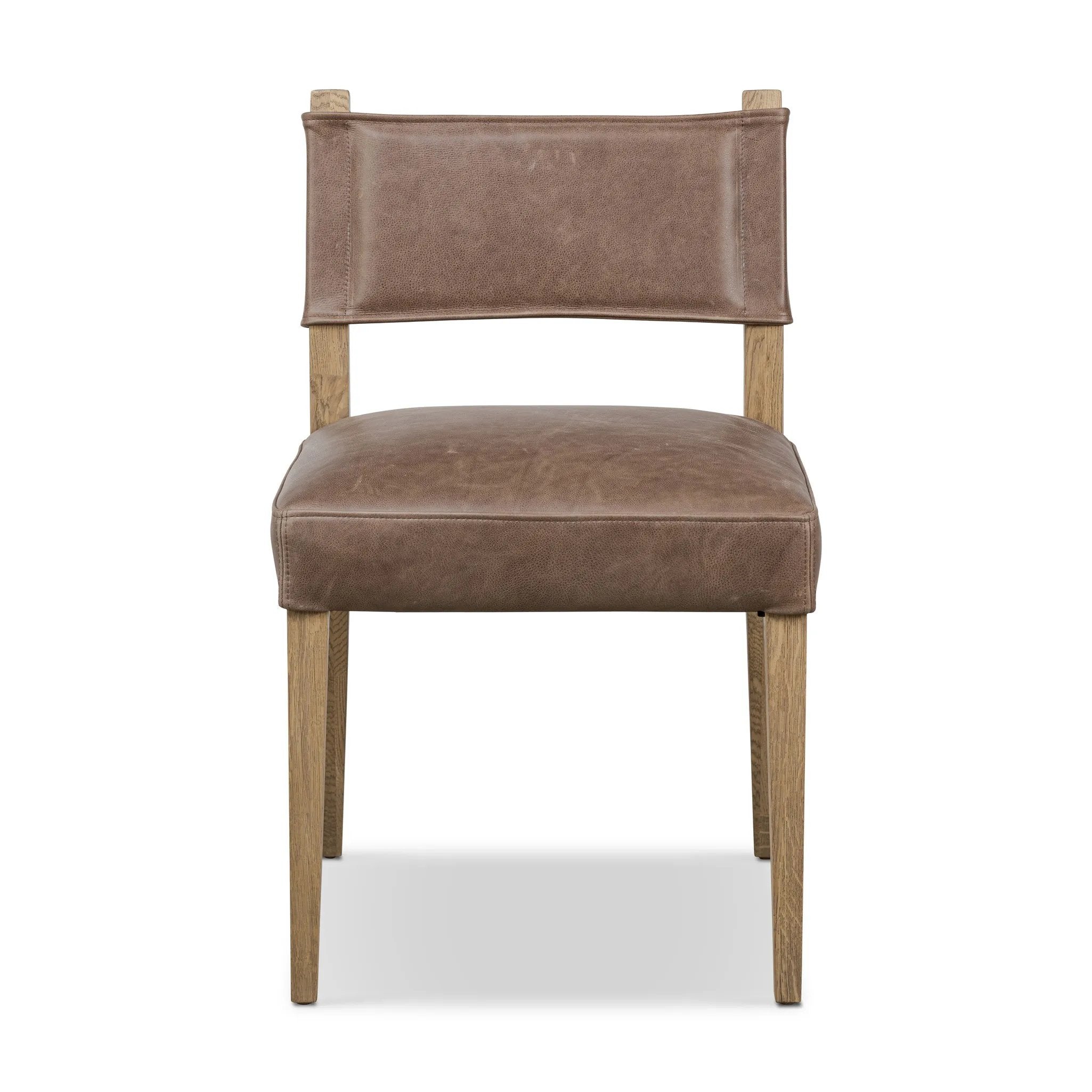 Featuring Ferris Palermo Cigar Dining Chair by Four Hands at Amethyst Home. Mixed materials at their finest. Brown parawood forms a slight, simple frame for squared seating of neutral performance-grade upholstery. Charcoal top-grain leather backing takes this modern-minded dining chair to the next level.Overall Dimensions: 20.00"w x 22.00"d x 32.00"hWeight. Amethyst Home provides interior design, new home construction design consulting, vintage area rugs, and lighting in the Alpharetta metro area.