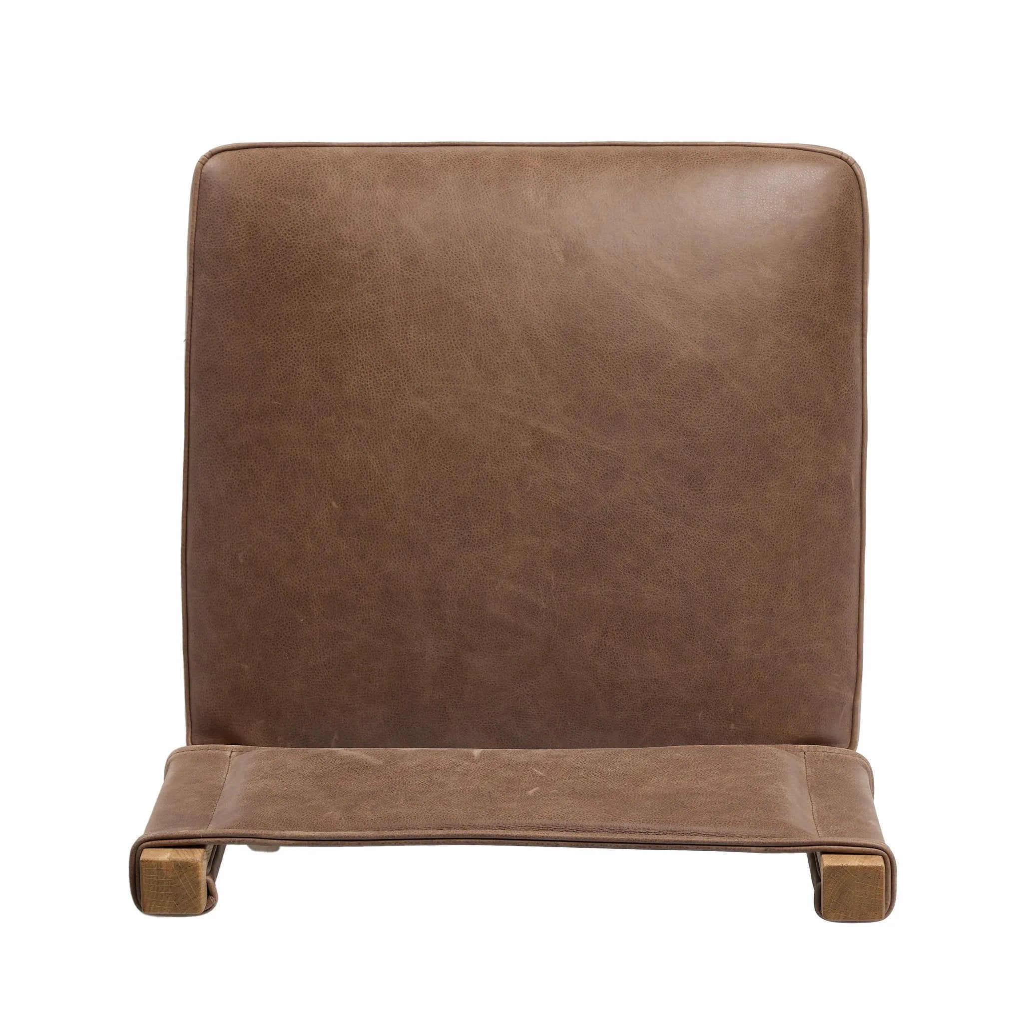 Featuring Ferris Palermo Cigar Dining Chair by Four Hands at Amethyst Home. Mixed materials at their finest. Brown parawood forms a slight, simple frame for squared seating of neutral performance-grade upholstery. Charcoal top-grain leather backing takes this modern-minded dining chair to the next level.Overall Dimensions: 20.00"w x 22.00"d x 32.00"hWeight . Amethyst Home provides interior design, new home construction design consulting, vintage area rugs, and lighting in the San Diego metro area.
