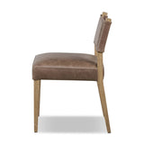 Featuring Ferris Palermo Cigar Dining Chair by Four Hands at Amethyst Home. Mixed materials at their finest. Brown parawood forms a slight, simple frame for squared seating of neutral performance-grade upholstery. Charcoal top-grain leather backing takes this modern-minded dining chair to the next level.Overall Dimensions: 20.00"w x 22.00"d x 32.00"hWeight. Amethyst Home provides interior design, new home construction design consulting, vintage area rugs, and lighting in the Scottsdale metro area.