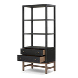 Woven black raffia drawers offer closed storage and a texture-driven take on book shelving. Antique brass-finished hardware adds a touch of vintage detailing, all framed within solid mahogany Amethyst Home provides interior design, new home construction design consulting, vintage area rugs, and lighting in the Austin metro area.