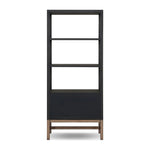 Woven black raffia drawers offer closed storage and a texture-driven take on book shelving. Antique brass-finished hardware adds a touch of vintage detailing, all framed within solid mahogany Amethyst Home provides interior design, new home construction design consulting, vintage area rugs, and lighting in the Dallas metro area.