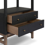 Woven black raffia drawers offer closed storage and a texture-driven take on book shelving. Antique brass-finished hardware adds a touch of vintage detailing, all framed within solid mahogany Amethyst Home provides interior design, new home construction design consulting, vintage area rugs, and lighting in the Kansas City metro area.