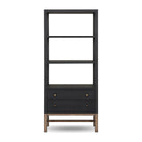 Woven black raffia drawers offer closed storage and a texture-driven take on book shelving. Antique brass-finished hardware adds a touch of vintage detailing, all framed within solid mahogany Amethyst Home provides interior design, new home construction design consulting, vintage area rugs, and lighting in the Monterey metro area.