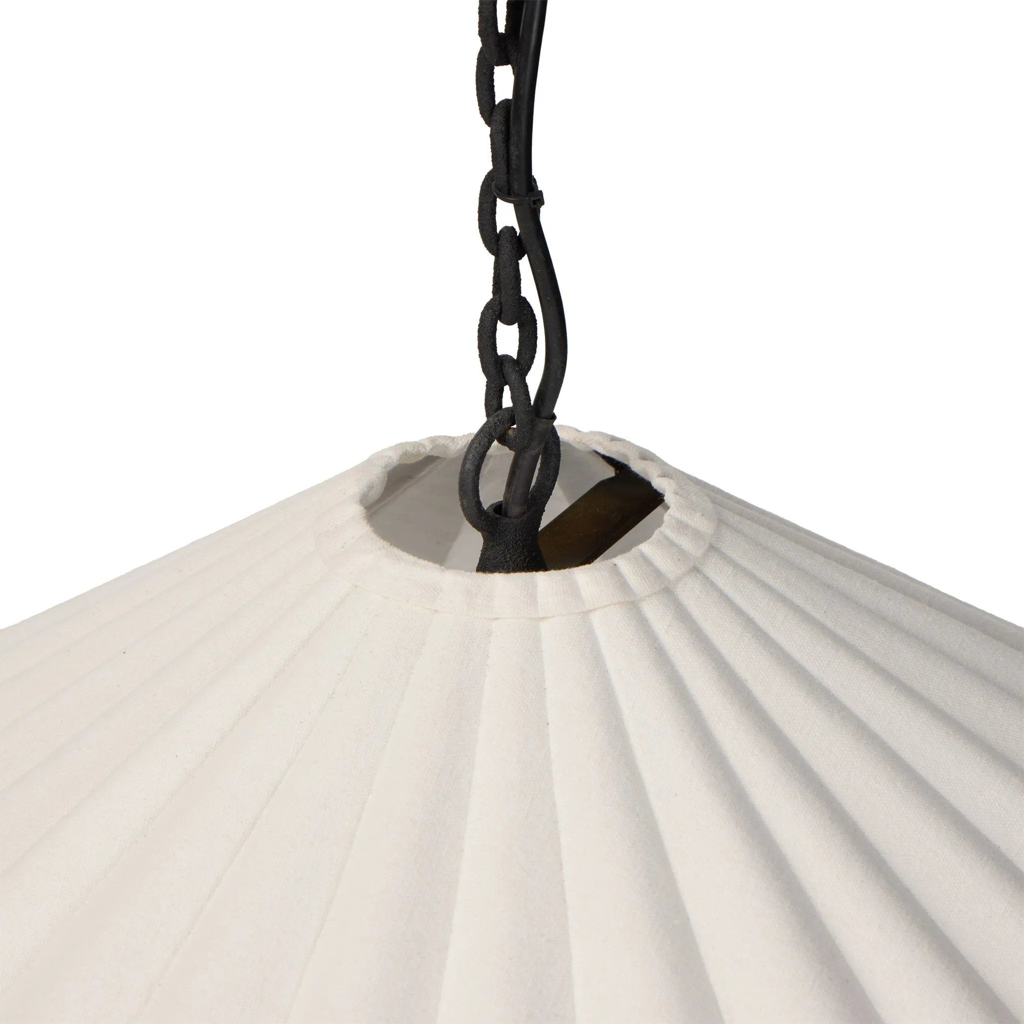 Textures and contrasting hues unite for this pendant's beautiful glow. The overscale scalloped shade features a creamy white canvas exterior covering a dark, antiqued brass interior, and a wrought iron chain for maximum drama Amethyst Home provides interior design, new home construction design consulting, vintage area rugs, and lighting in the Charlotte metro area.