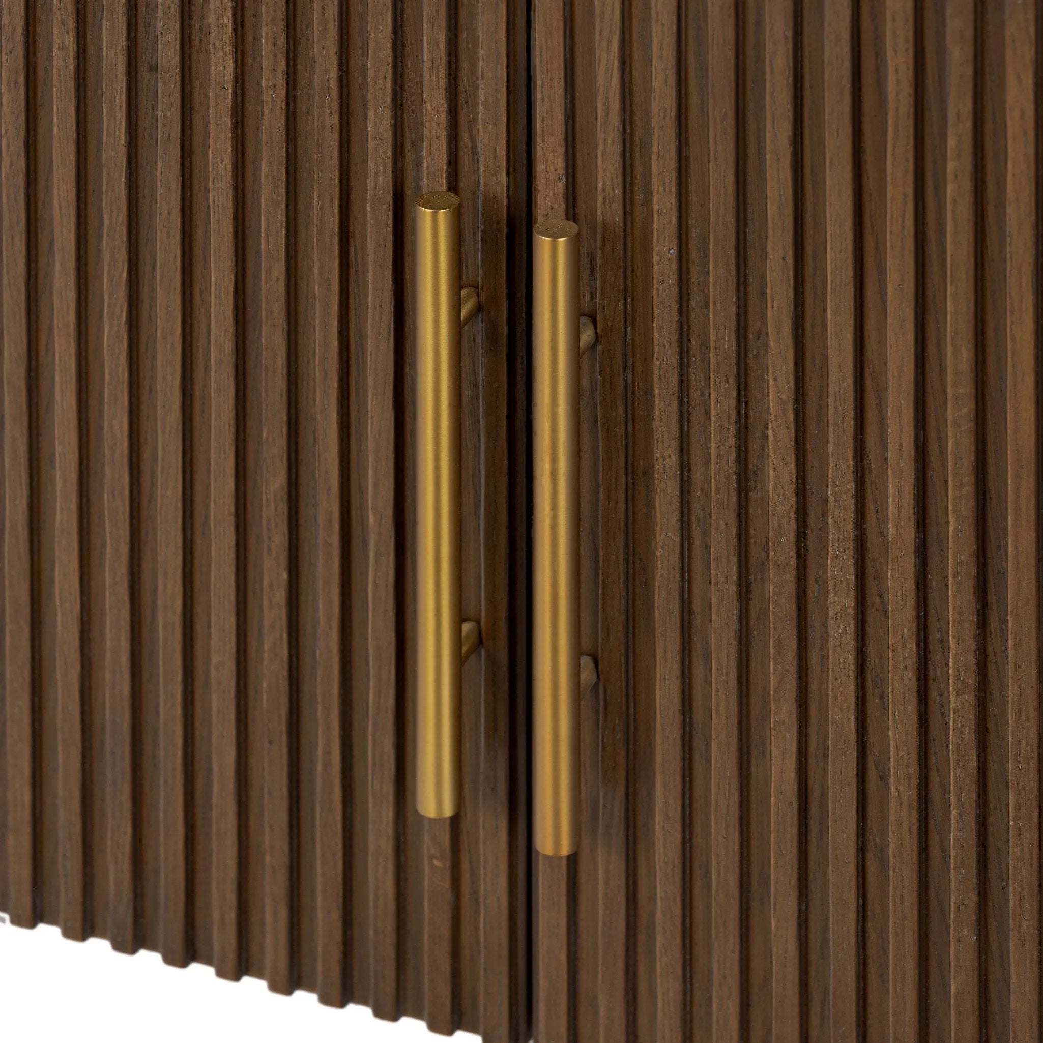 Featuring Fletcher Terra Brown Oak Media Console by Four Hands at Amethyst Home. Rich with reeding for texture and a linear look, this brown oak media console features four doors with brushed brass hardware and curved corners. Its top is a slab of bluestone, adding a striking material mix, while white mineral lines and natural variations mark the uniqueness of . Amethyst Home provides interior design, new home construction design consulting, vintage area rugs, and lighting in the Tampa metro area.