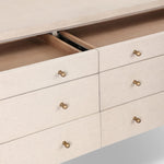 A soft statement console table with ample storage, inspired by a dresser silhouette. The elevated case is wrapped in painted linen and sits atop an oak base for a light and airy look Amethyst Home provides interior design, new home construction design consulting, vintage area rugs, and lighting in the Miami metro area.