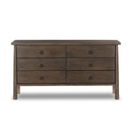 Inspired by French antique design, this dresser stands on round tapered legs with a prominent overhang top. Made of mango wood with cast iron key ring pulls, six drawers make it a versatile addition to the bedroom Amethyst Home provides interior design, new home construction design consulting, vintage area rugs, and lighting in the Austin metro area.