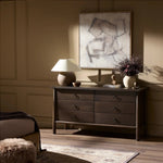 Inspired by French antique design, this dresser stands on round tapered legs with a prominent overhang top. Made of mango wood with cast iron key ring pulls, six drawers make it a versatile addition to the bedroom Amethyst Home provides interior design, new home construction design consulting, vintage area rugs, and lighting in the Nashville metro area.