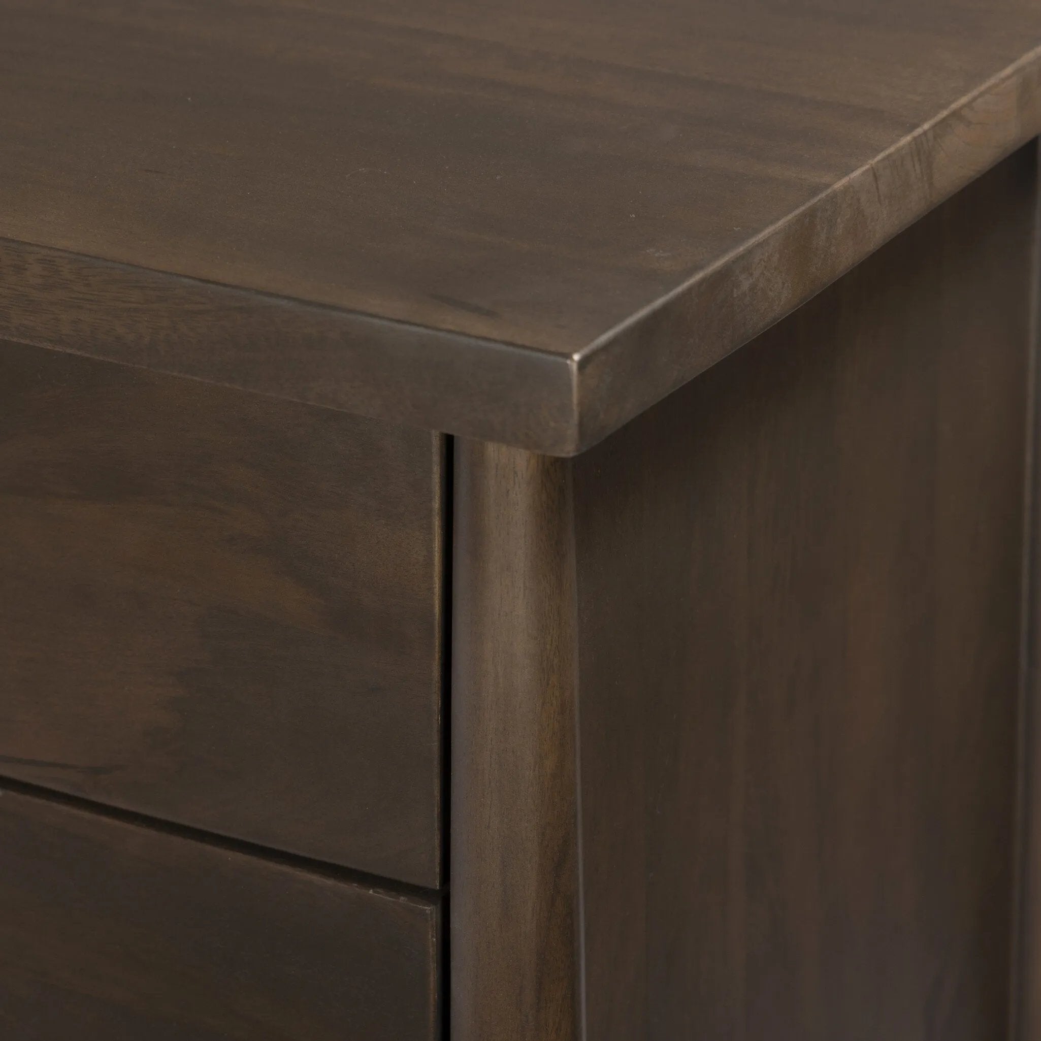 Inspired by French antique design, this dresser stands on round tapered legs with a prominent overhang top. Made of mango wood with cast iron key ring pulls, six drawers make it a versatile addition to the bedroom Amethyst Home provides interior design, new home construction design consulting, vintage area rugs, and lighting in the Omaha metro area.