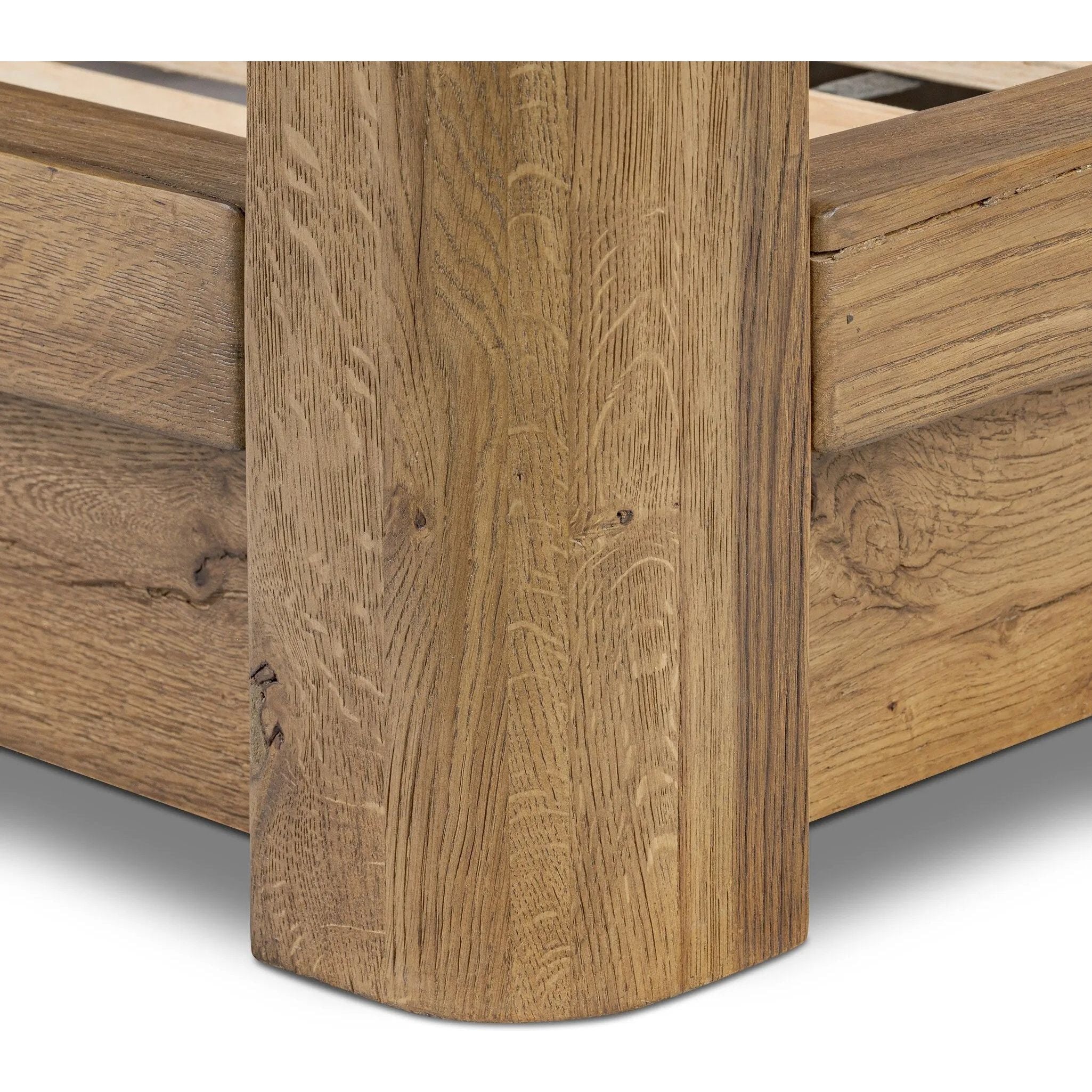 Minimalist and modern, this platform-style canopy bed is framed to a low profile and softened with an upholstered headboard.