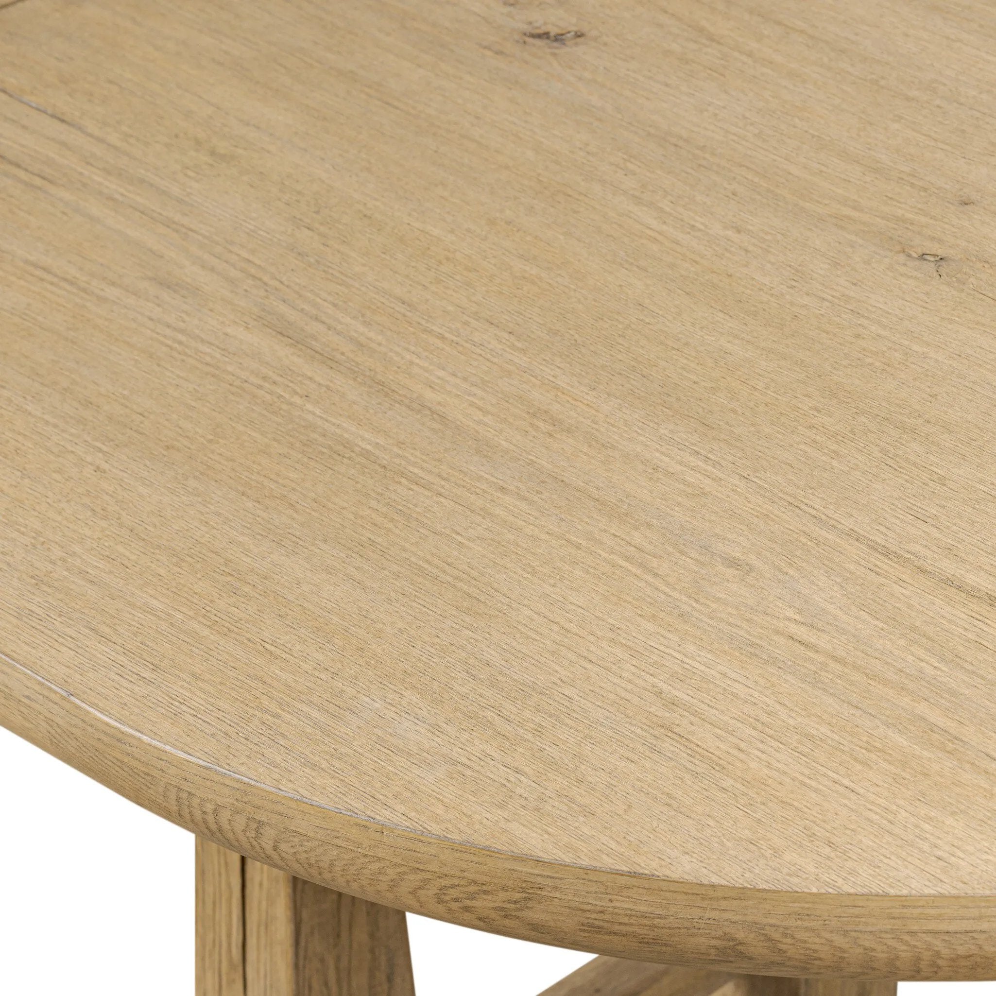 Make space to gather around. This extendable dining table is crafted from drifted oak veneer with a semi-trestle base, thick legs and an oval-shaped surface. The extension expands the table from 84" to a roomier 104" Amethyst Home provides interior design, new home construction design consulting, vintage area rugs, and lighting in the Houston metro area.