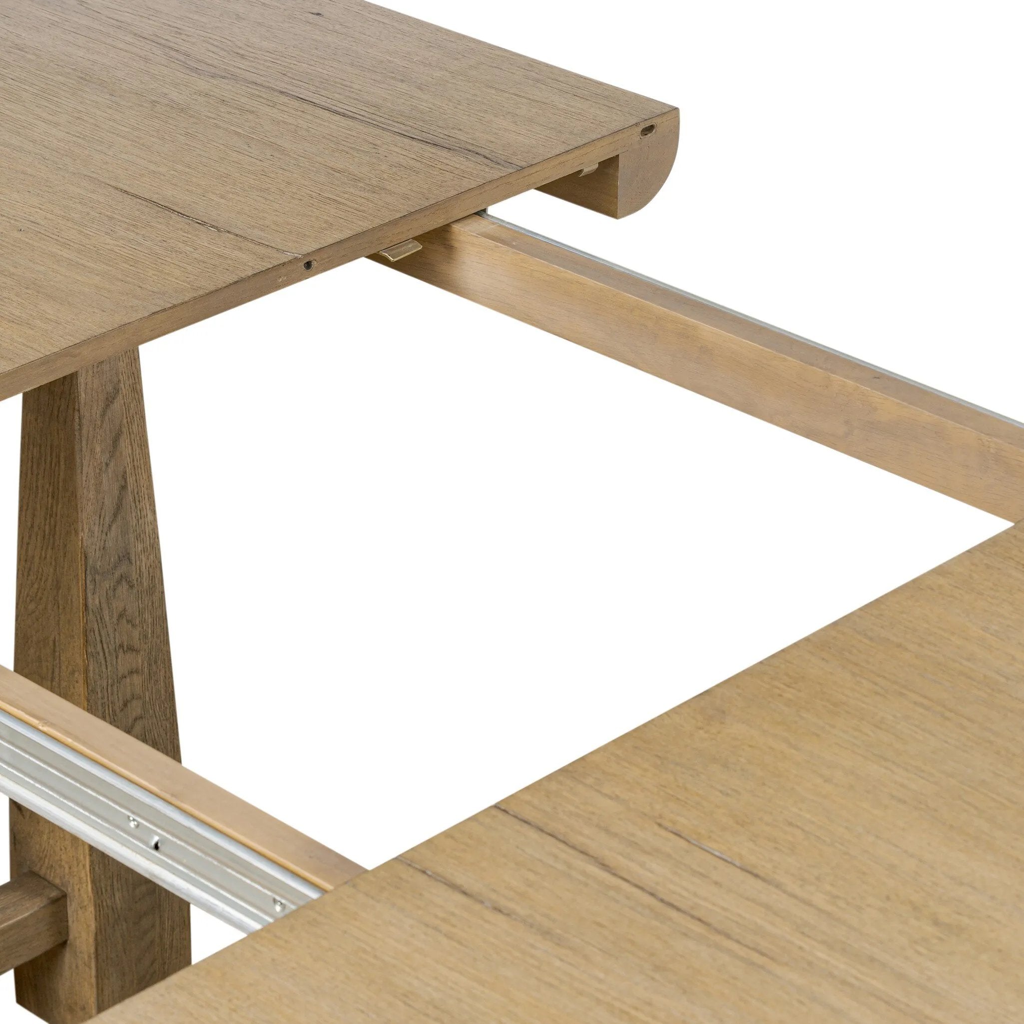Make space to gather around. This extendable dining table is crafted from drifted oak veneer with a semi-trestle base, thick legs and an oval-shaped surface. The extension expands the table from 84" to a roomier 104" Amethyst Home provides interior design, new home construction design consulting, vintage area rugs, and lighting in the Newport Beach metro area.