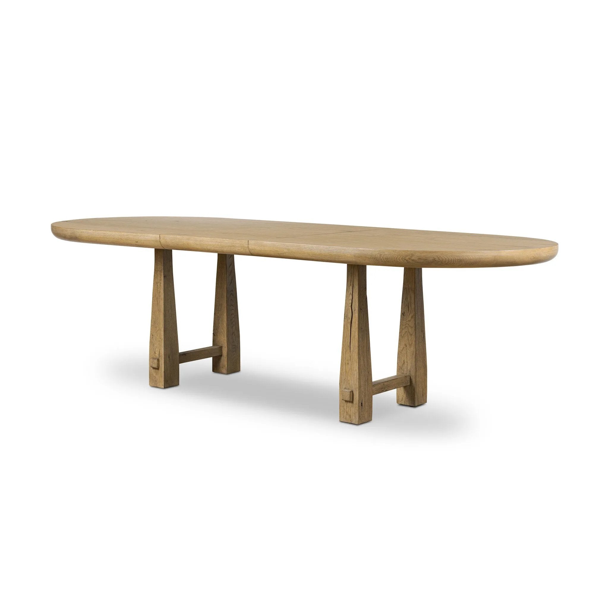 Make space to gather around. This extendable dining table is crafted from drifted oak veneer with a semi-trestle base, thick legs and an oval-shaped surface. The extension expands the table from 84" to a roomier 104" Amethyst Home provides interior design, new home construction design consulting, vintage area rugs, and lighting in the Salt Lake City metro area.