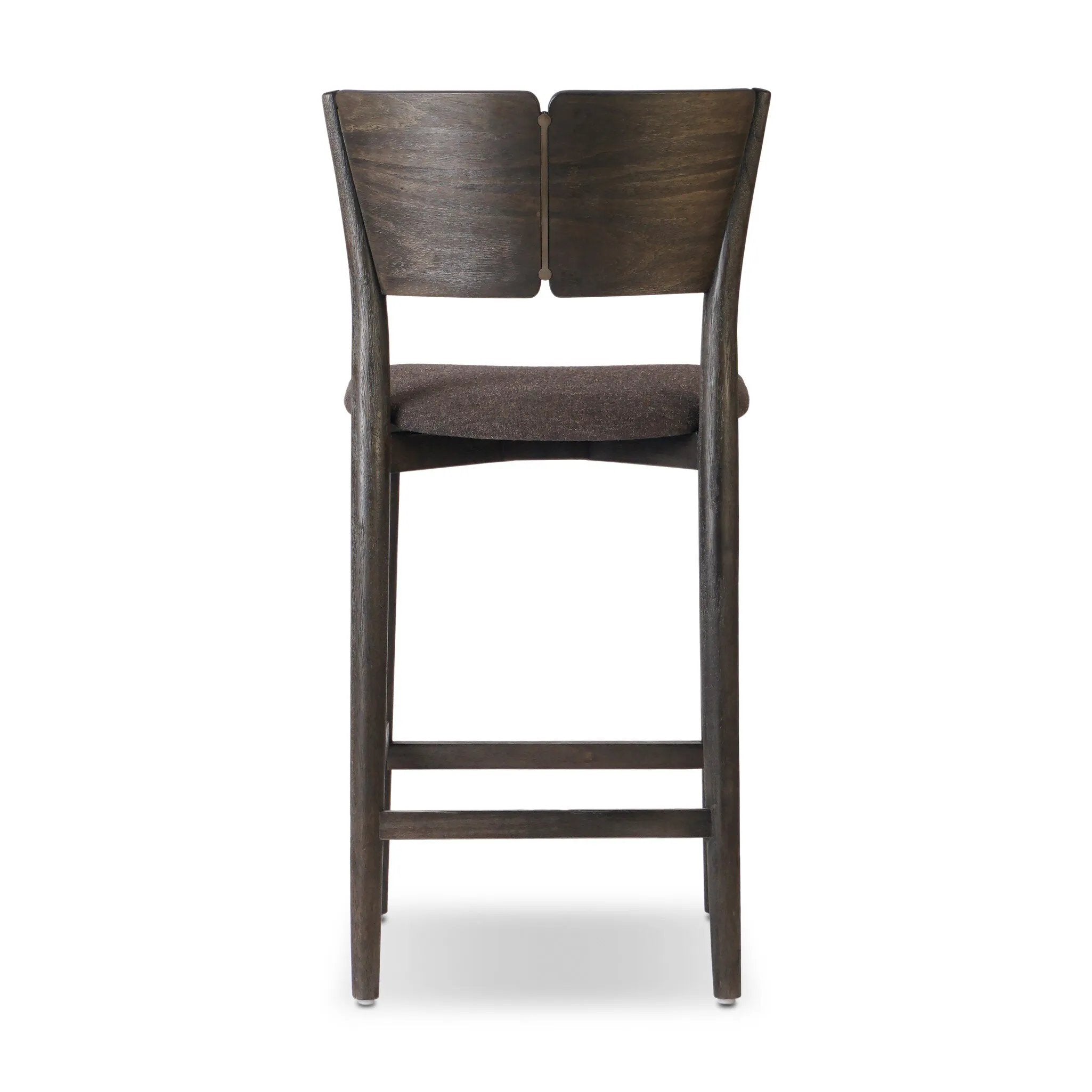 Inspired by simple Scandinavian styling, a dark-finished parawood stool's slit-back metal inlay adds a decorative touch. Easy curves from bent wood give a smooth silhouette. Sized for the counter and upholstered with a thin seat cushion upholstered in black performance fabric, perfect for dining or entertaining. Amethyst Home provides interior design, new home construction design consulting, vintage area rugs, and lighting in the Park City metro area.