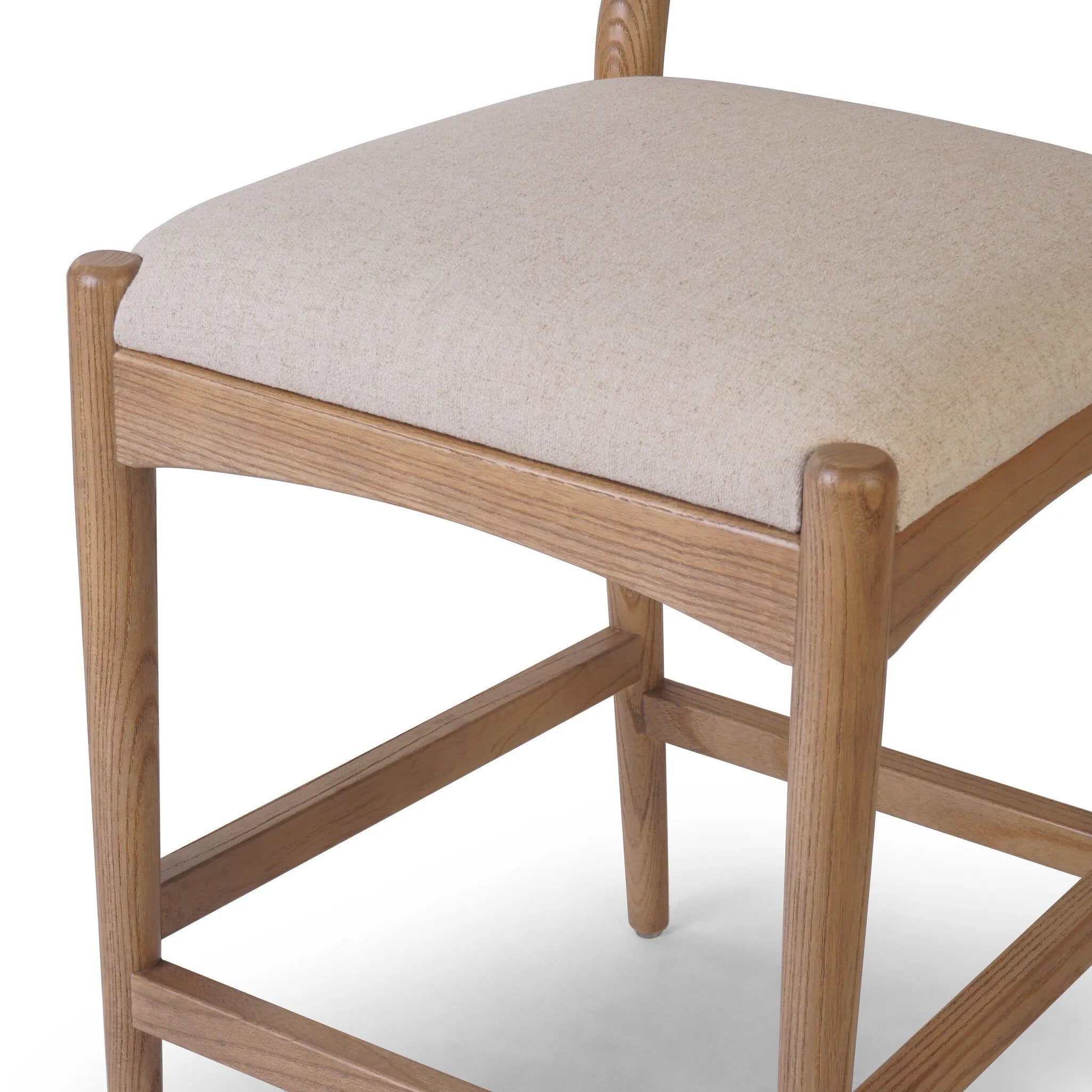 Featuring Haddon Antwerp Natural Counter Stool by Four Hands at Amethyst Home. A curved back wrapped and textural woven paper cord take this everyday counter stool to new heights. Natural nettlewood frames a linen-blend seat for a clean look.Overall Dimensions: 19.75"w x 23.25"d x 39.25"hWeight : 19.51 lbsMaterials : 39% Linen, 35% Cotton, 26% Polyester, S. Amethyst Home provides interior design, new home construction design consulting, vintage area rugs, and lighting in the Alpharetta metro area.