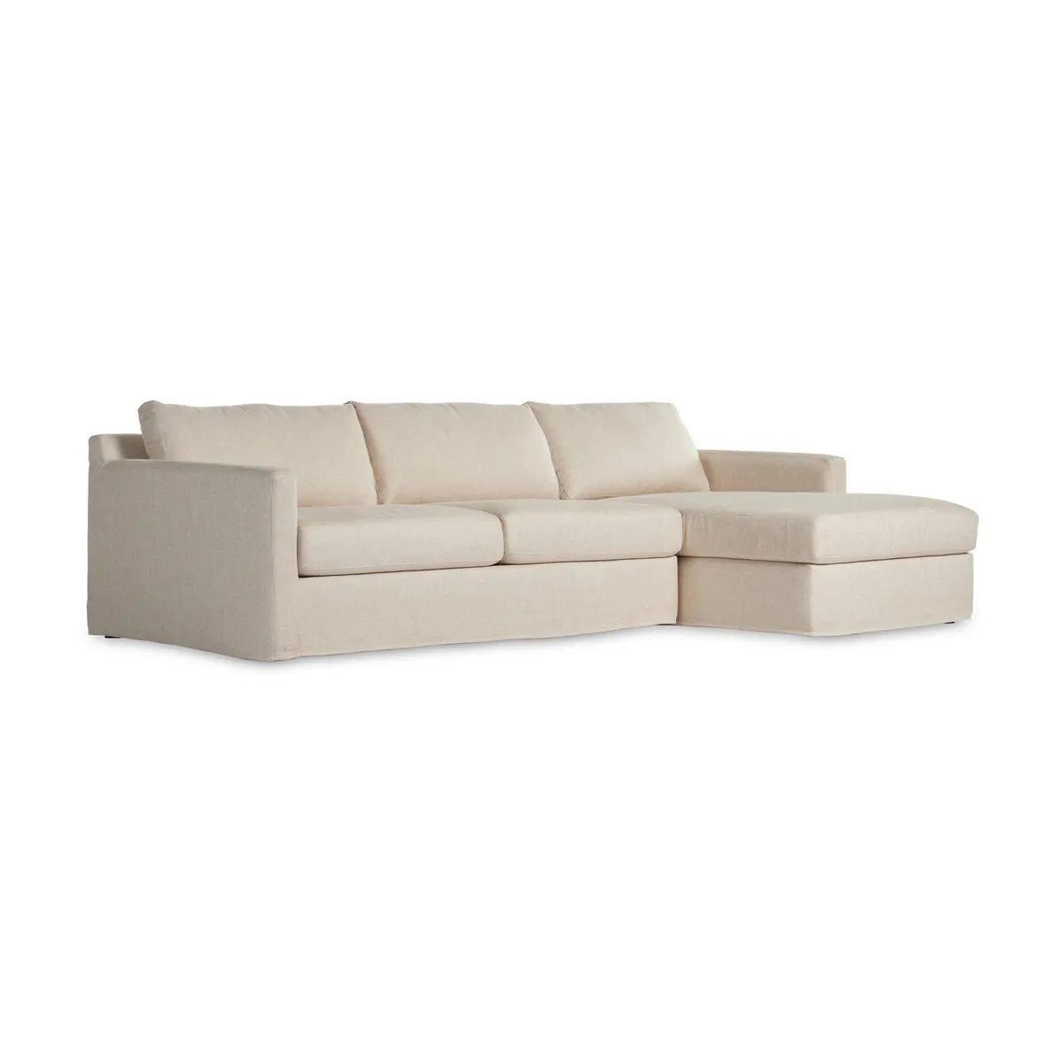 Featuring Hampton Evere Creme 2-Piece Right Chaise Slipcover Sectional by Four Hands at Amethyst Home. Proudly built by American makers using US-sourced materials and mechanisms. This slipcovered sectional features clean track arms for a classic, traditional look, PFAS-free performance fabric, and feather filling for a plush sit. Slipcovered styles are fu. Amethyst Home provides interior design, new home construction design consulting, vintage area rugs, and lighting in the Los Angeles metro area.