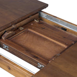 Design with flexibility. Finished in a warm toasted walnut, an oval acacia tabletop, cone-tapered legs and iron detailing speak to Scandinavian modernism. Expansion from 84" to 104" means more space when company calls Amethyst Home provides interior design, new home construction design consulting, vintage area rugs, and lighting in the Tampa metro area.