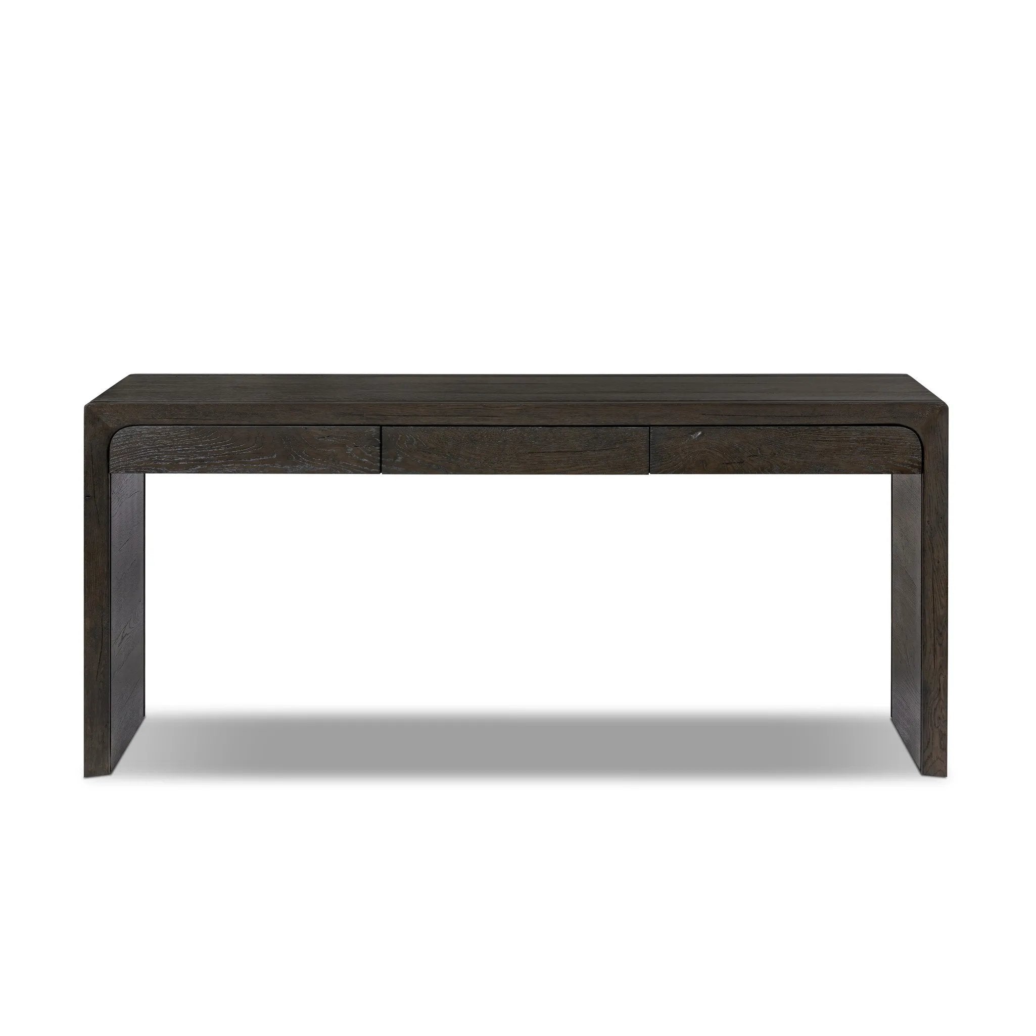 Featuring Henry Charcoal Oak Thick Veneer Desk by Four Hands at Amethyst Home. Made from solid reclaimed oak finished in a rustic charcoal, this slim-profile desk shapes subtly curved corners, bringing a handcrafted look to a minimalist form. Designed in partnership with longtime Four Hands collaborator Thomas Bina and Brazilian designer Ronald Sasson.Overa. Amethyst Home provides interior design, new home construction design consulting, vintage area rugs, and lighting in the Park City metro area.