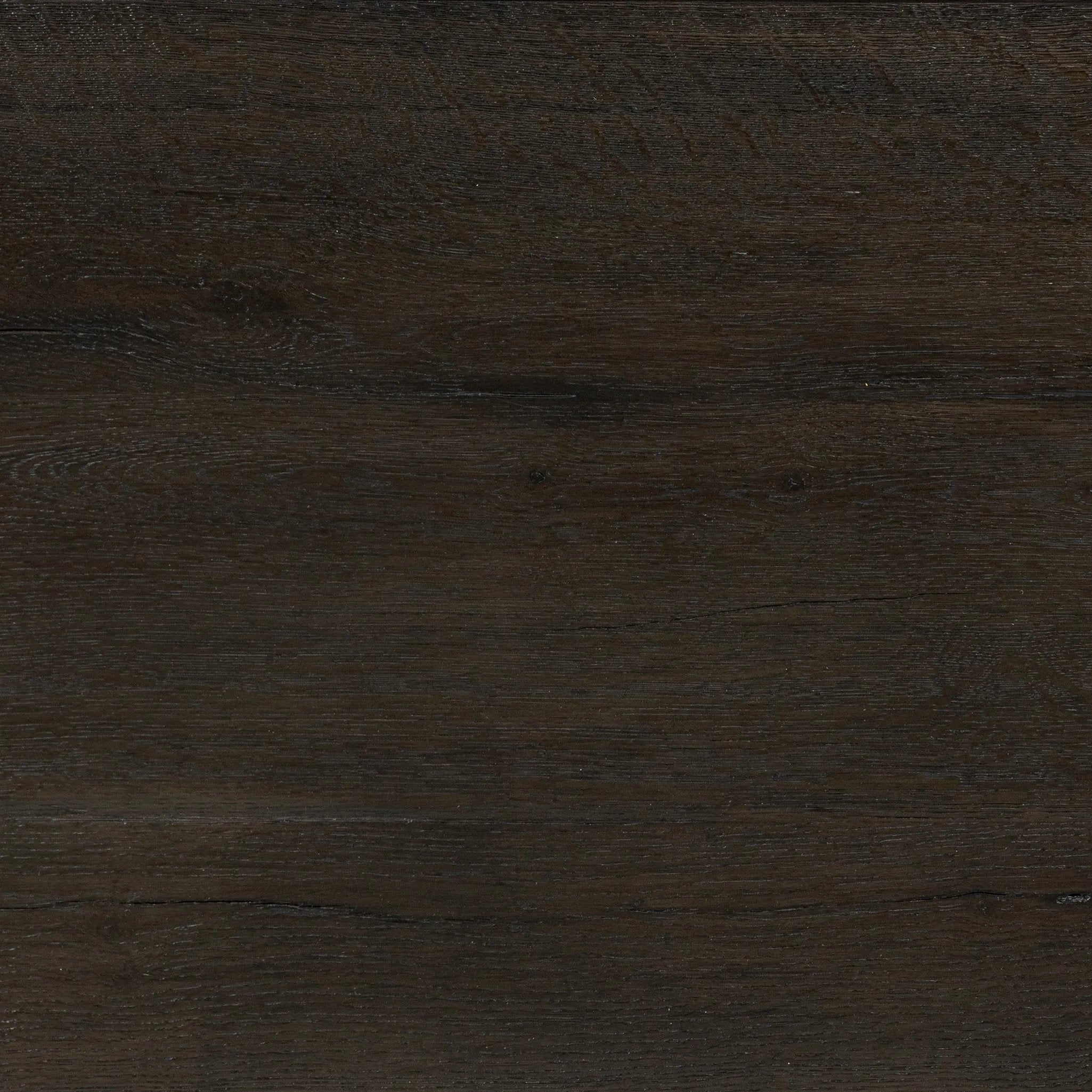 Featuring Henry Charcoal Oak Thick Veneer Desk by Four Hands at Amethyst Home. Made from solid reclaimed oak finished in a rustic charcoal, this slim-profile desk shapes subtly curved corners, bringing a handcrafted look to a minimalist form. Designed in partnership with longtime Four Hands collaborator Thomas Bina and Brazilian designer Ronald Sasson.Over. Amethyst Home provides interior design, new home construction design consulting, vintage area rugs, and lighting in the Washington metro area.