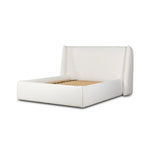 Angled wings anchor the sides of this reimagined shelter bed, grounding an upholstered bed frame. Off-white Crypton® performance fabric covers all-around cushioning. Crypton® performance fabric is specially engineered for protection against stains, moisture and odor Amethyst Home provides interior design, new home construction design consulting, vintage area rugs, and lighting in the Miami metro area.