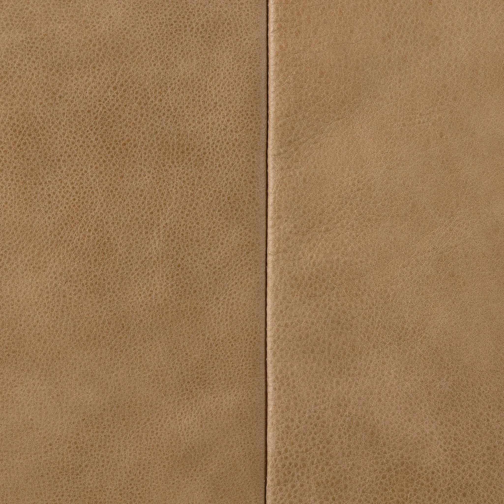 Elevate your everyday with a luxurious twist on the slipcovered sofa. Rich top-grain leather covers wide arms, tapered framing and knife-edge cushioning designed for comfort. Slipcover fully removable Amethyst Home provides interior design, new home construction design consulting, vintage area rugs, and lighting in the Dallas metro area.