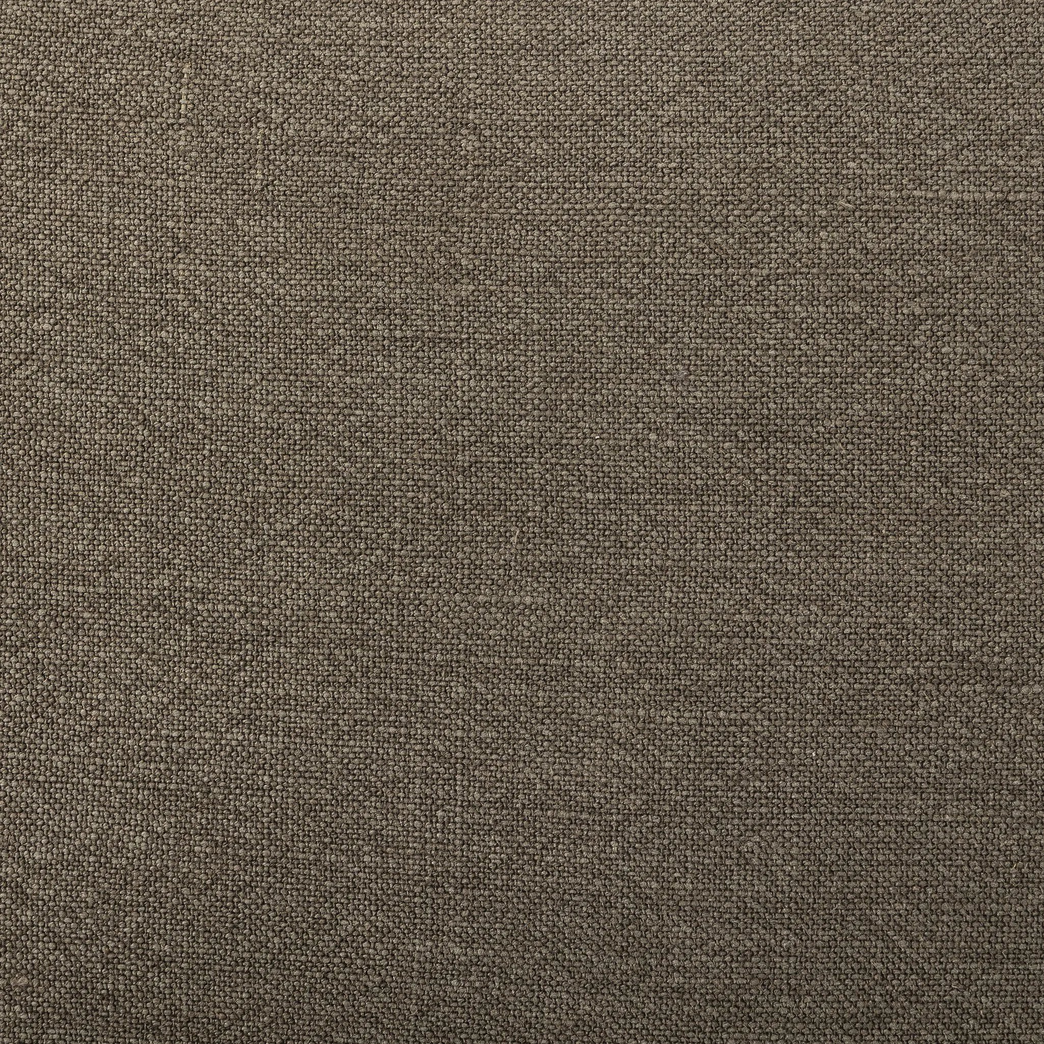 On-trend and expertly tailored, a texture-driven chair is upholstered in an olive flax/linen blend and wrapped with natural rattan, with linear iron legs finished in a complementary gunmetal Amethyst Home provides interior design, new home construction design consulting, vintage area rugs, and lighting in the Dallas metro area.