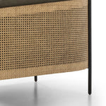 On-trend and expertly tailored, a texture-driven chair is upholstered in an olive flax/linen blend and wrapped with natural rattan, with linear iron legs finished in a complementary gunmetal Amethyst Home provides interior design, new home construction design consulting, vintage area rugs, and lighting in the Portland metro area.