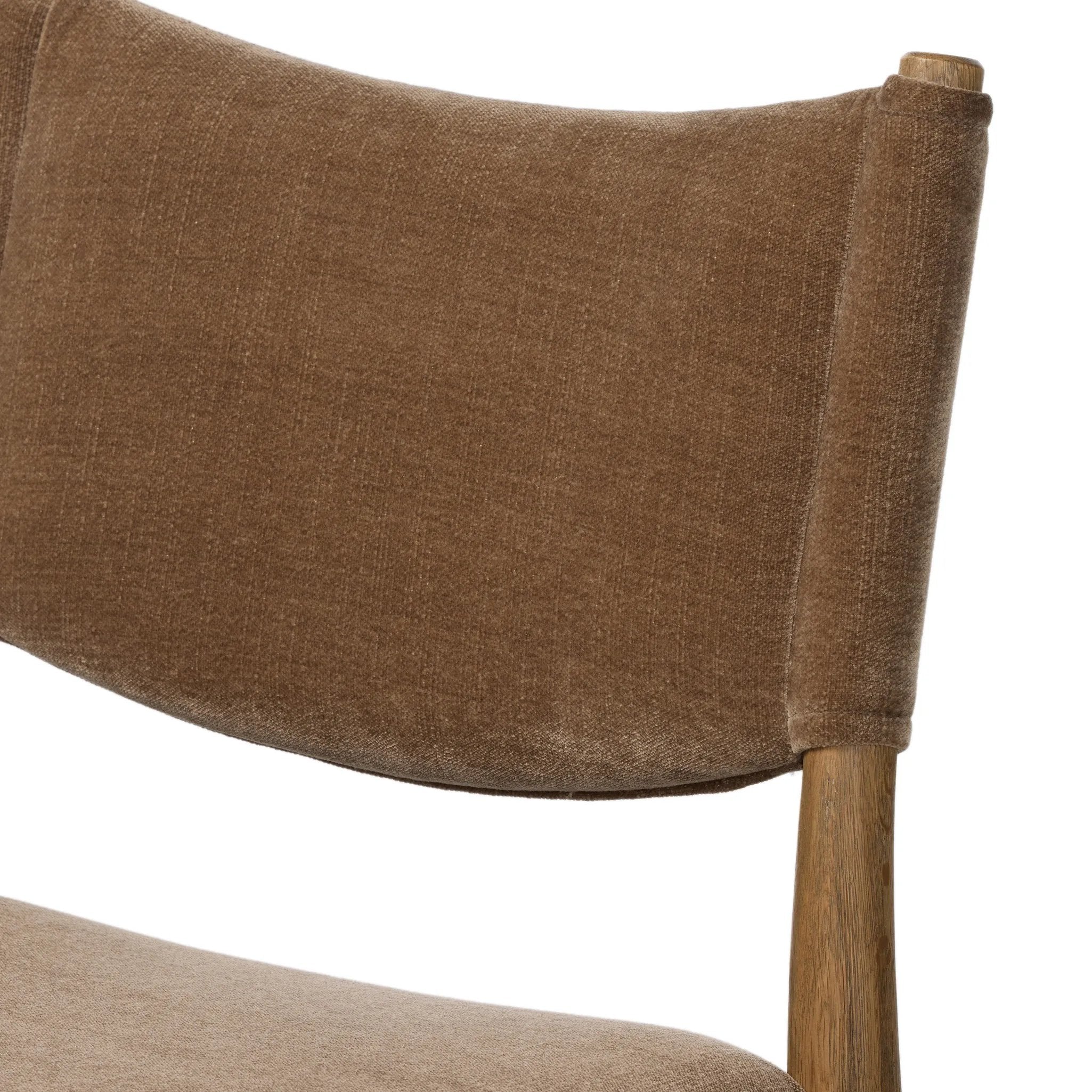 A fresh take on midcentury styling, perfectly sized for the counter. Supportive back and seat cushions are upholstered in a soft, neutral fabric and framed out by toasted solid oak Amethyst Home provides interior design, new home construction design consulting, vintage area rugs, and lighting in the Scottsdale metro area.