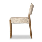 A midcentury-inspired piece brought to modern times. A supportive, sling-style back and seat cushion are upholstered in a soft, velvety fabric, with toasted oak armless framing Amethyst Home provides interior design, new home construction design consulting, vintage area rugs, and lighting in the Portland metro area.