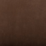 A midcentury-inspired piece brought to modern times. A supportive, sling-style back and seat cushion are upholstered in a soft, velvety fabric, with toasted oak armless framing Amethyst Home provides interior design, new home construction design consulting, vintage area rugs, and lighting in the Houston metro area.