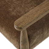 A midcentury-inspired piece brought to modern speed. A supportive, sling-style back and seat cushion are upholstered in a soft, velvety fabric, with toasted oak arms prime for the head of the table Amethyst Home provides interior design, new home construction design consulting, vintage area rugs, and lighting in the Scottsdale metro area.