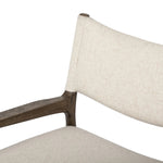 A midcentury-inspired piece, updated for modern times. A supportive back and seat cushion are upholstered in high-performance fabric, with walnut-finished wooden armrests prime for the head of the table. Steam regularly to keep fabric looking crisp. Amethyst Home provides interior design, new home construction design consulting, vintage area rugs, and lighting in the Laguna Beach metro area.