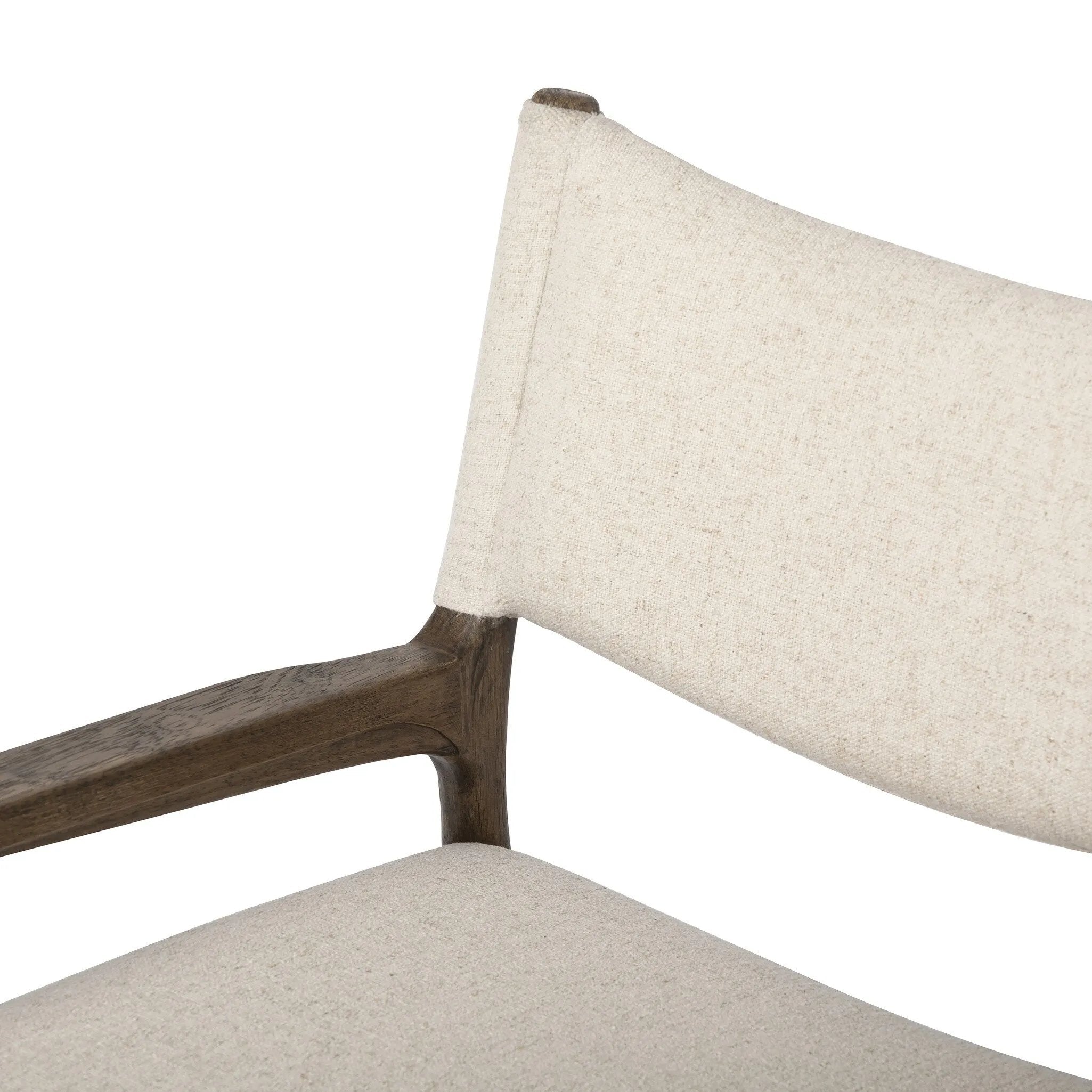 A midcentury-inspired piece, updated for modern times. A supportive back and seat cushion are upholstered in high-performance fabric, with walnut-finished wooden armrests prime for the head of the table. Steam regularly to keep fabric looking crisp. Amethyst Home provides interior design, new home construction design consulting, vintage area rugs, and lighting in the Laguna Beach metro area.