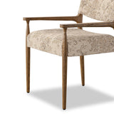 A midcentury-inspired piece brought to modern speed. A supportive, sling-style back and seat cushion are upholstered in a soft, velvety fabric, with toasted oak arms prime for the head of the table Amethyst Home provides interior design, new home construction design consulting, vintage area rugs, and lighting in the Los Angeles metro area.