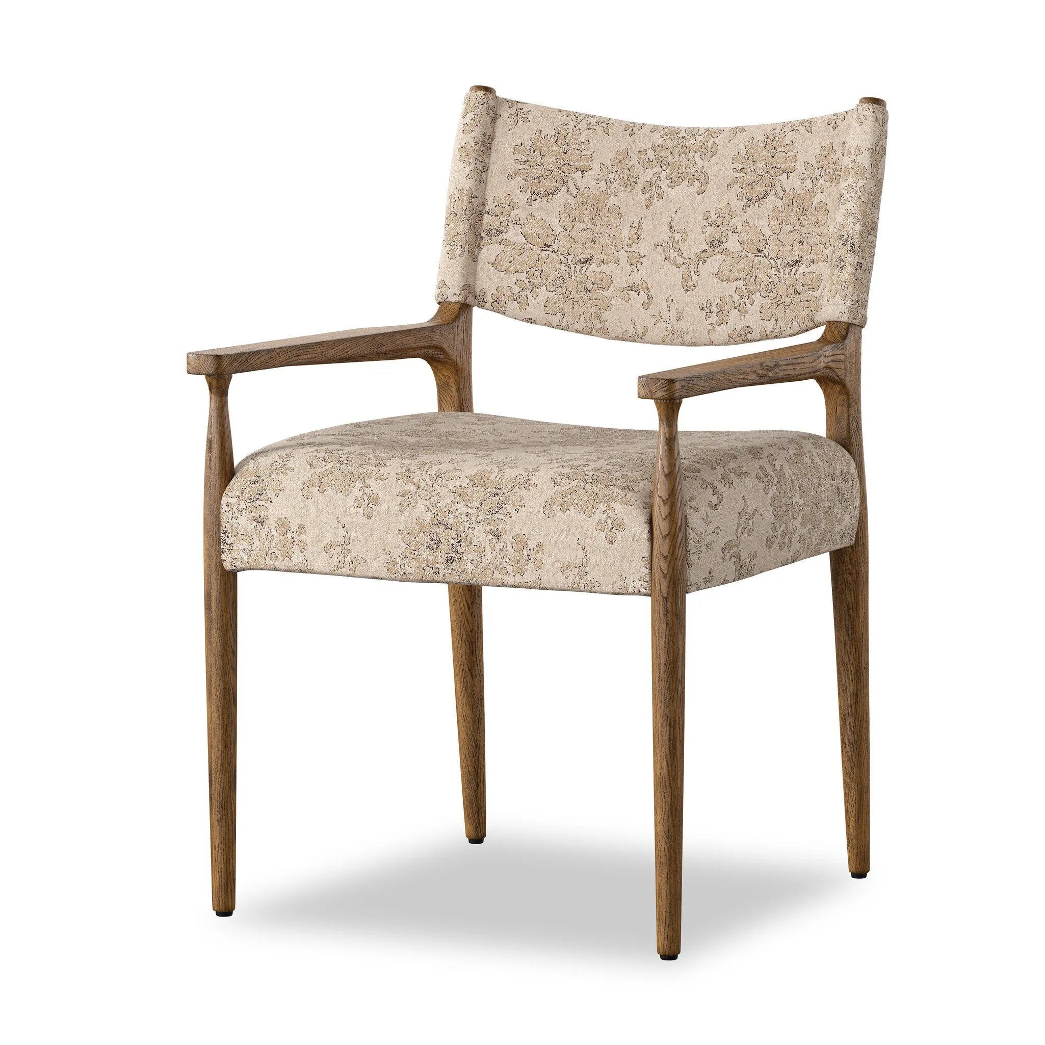 A midcentury-inspired piece brought to modern speed. A supportive, sling-style back and seat cushion are upholstered in a soft, velvety fabric, with toasted oak arms prime for the head of the table Amethyst Home provides interior design, new home construction design consulting, vintage area rugs, and lighting in the Winter Garden metro area.