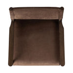 A midcentury-inspired piece brought to modern speed. A supportive, sling-style back and seat cushion are upholstered in a soft, velvety fabric, with toasted oak arms prime for the head of the table Amethyst Home provides interior design, new home construction design consulting, vintage area rugs, and lighting in the Laguna Beach metro area.