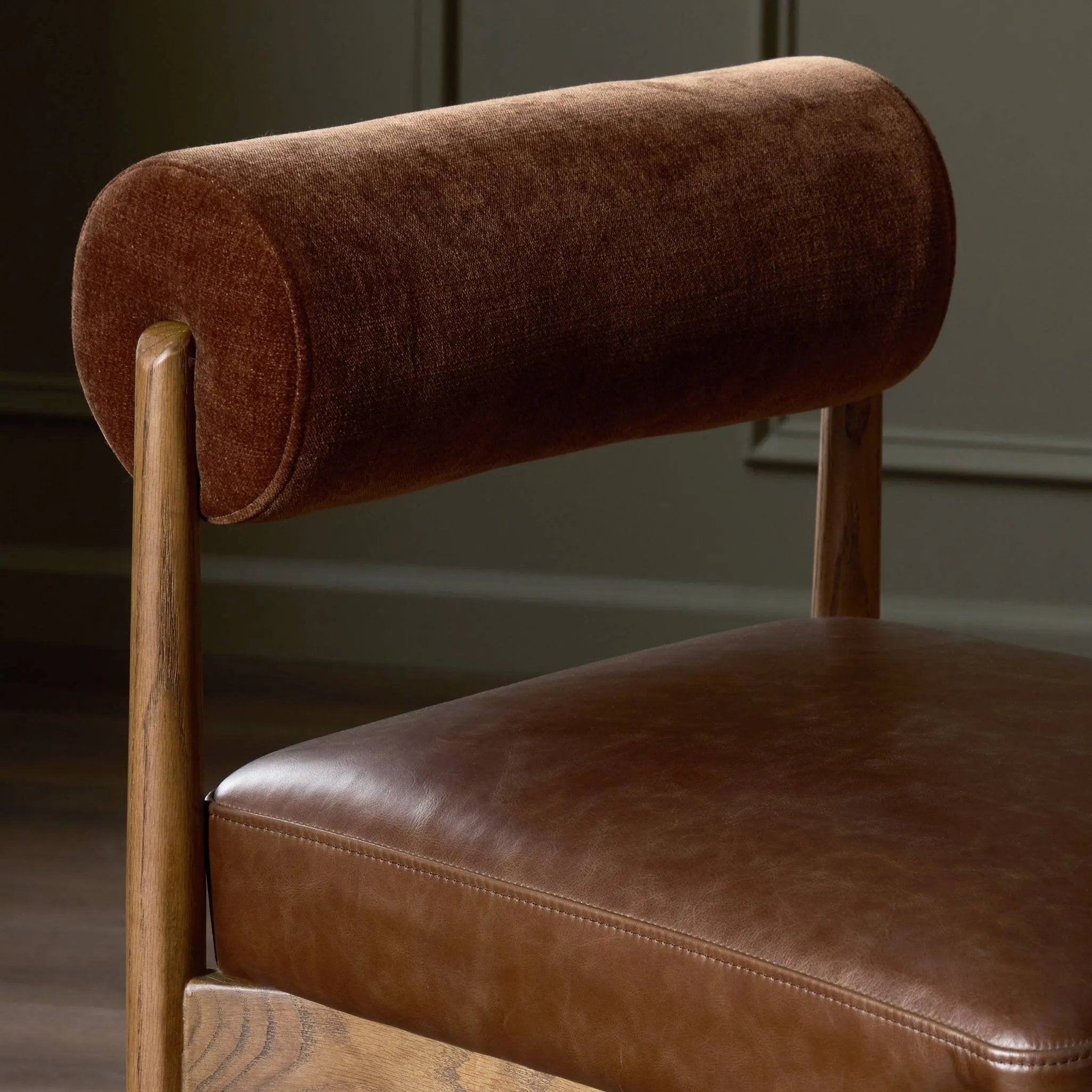 Featuring Jazelle Altair Sienna Counter Stool by Four Hands at Amethyst Home. The classic counter stool gets a playful update with a bolstered cylinder seat back. Made from top-grain leather and warm-finished oak to elevate your bar, kitchen or dining space. Overall Dimensions: 22.25"w x 25.75"d x 36.50"h. Amethyst Home provides interior design, new home construction design consulting, vintage area rugs, and lighting in the Los Angeles metro area.