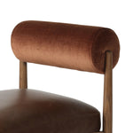 The classic counter stool gets a playful update with a bolstered cylinder seat back. Made from top-grain leather, velvet-like upholstery and warm-finished oak to elevate your bar, kitchen or dining space Amethyst Home provides interior design, new home construction design consulting, vintage area rugs, and lighting in the Austin metro area.