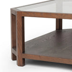 Featuring Jenzen Tempered Glass Coffee Table by Four Hands at Amethyst Home. Mix materials for a timeless look. Warm, brown oak shapes a unique octagon frame for a tempered glass top. Lower open shelving brings bonus storage and display options to your living space. Overall Dimensions: 48.00"w x 48.00"d x 16.50"h. Amethyst Home provides interior design, new home construction design consulting, vintage area rugs, and lighting in the Austin metro area.
