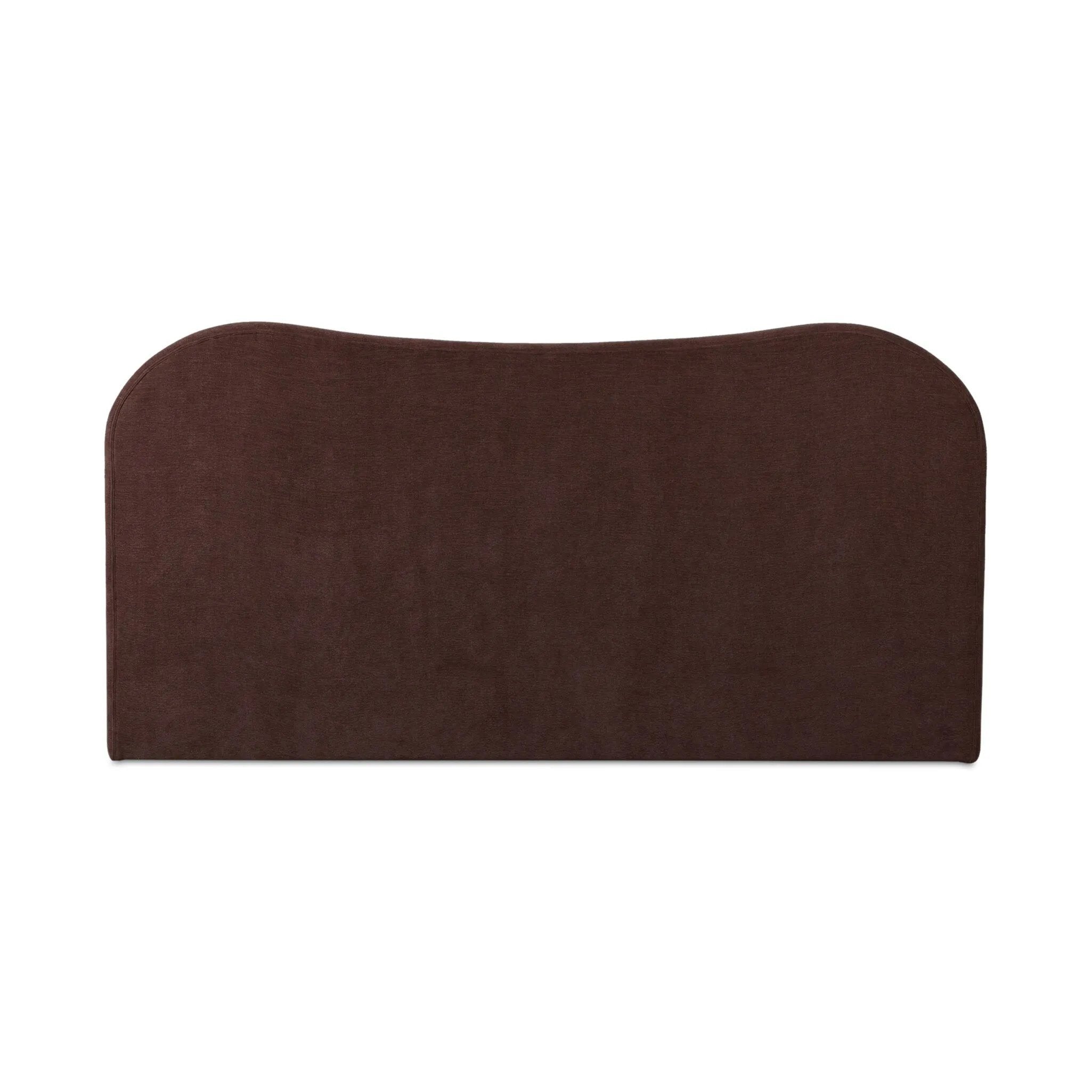 Subtly curved, this swooping bed frame is fully upholstered in a soft, plum-hue fabric for an inviting look that's rich in comfort Amethyst Home provides interior design, new home construction design consulting, vintage area rugs, and lighting in the Charlotte metro area.