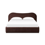 Subtly curved, this swooping bed frame is fully upholstered in a soft, plum-hue fabric for an inviting look that's rich in comfort Amethyst Home provides interior design, new home construction design consulting, vintage area rugs, and lighting in the Dallas metro area.