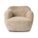 With a supple pile that's soft to the touch, taupe shearling upholstery pairs with an S-spring seat and enveloped frame for an inviting look and feel on this 360-degree swivel chair Amethyst Home provides interior design, new home construction design consulting, vintage area rugs, and lighting in the Salt Lake City metro area.