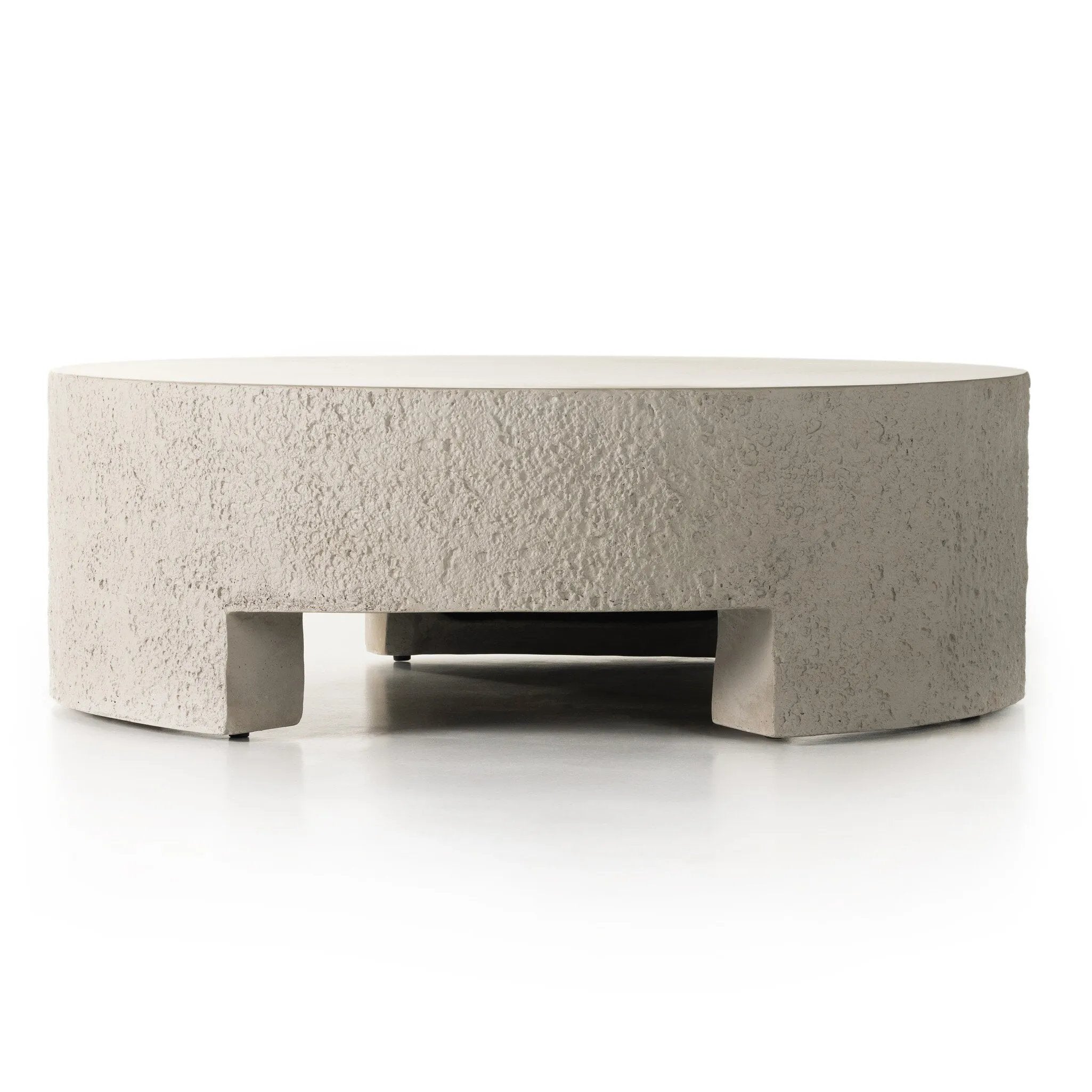 Featuring Everett Matte Stone Outdoor Coffee Table by Four Hands at Amethyst Home. A textured, white concrete coffee table perfect for modern and wabi sabi style.  The table has a matte texture and is perfect for indoors or outdoors.Overall Dimensions: 48.00"w x 48.00"d x 16.25"hWeight : 277.78 lbsMaterials : Concrete. Amethyst Home provides interior design, new home construction design consulting, vintage area rugs, and lighting in the Calabasas metro area.