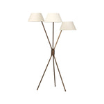 A tripod-base floor lamp, provides light in every direction. Made with slim, sturdy iron in a rubbed bronze finish and topped with linen shades for a soft glow Amethyst Home provides interior design, new home construction design consulting, vintage area rugs, and lighting in the Omaha metro area.