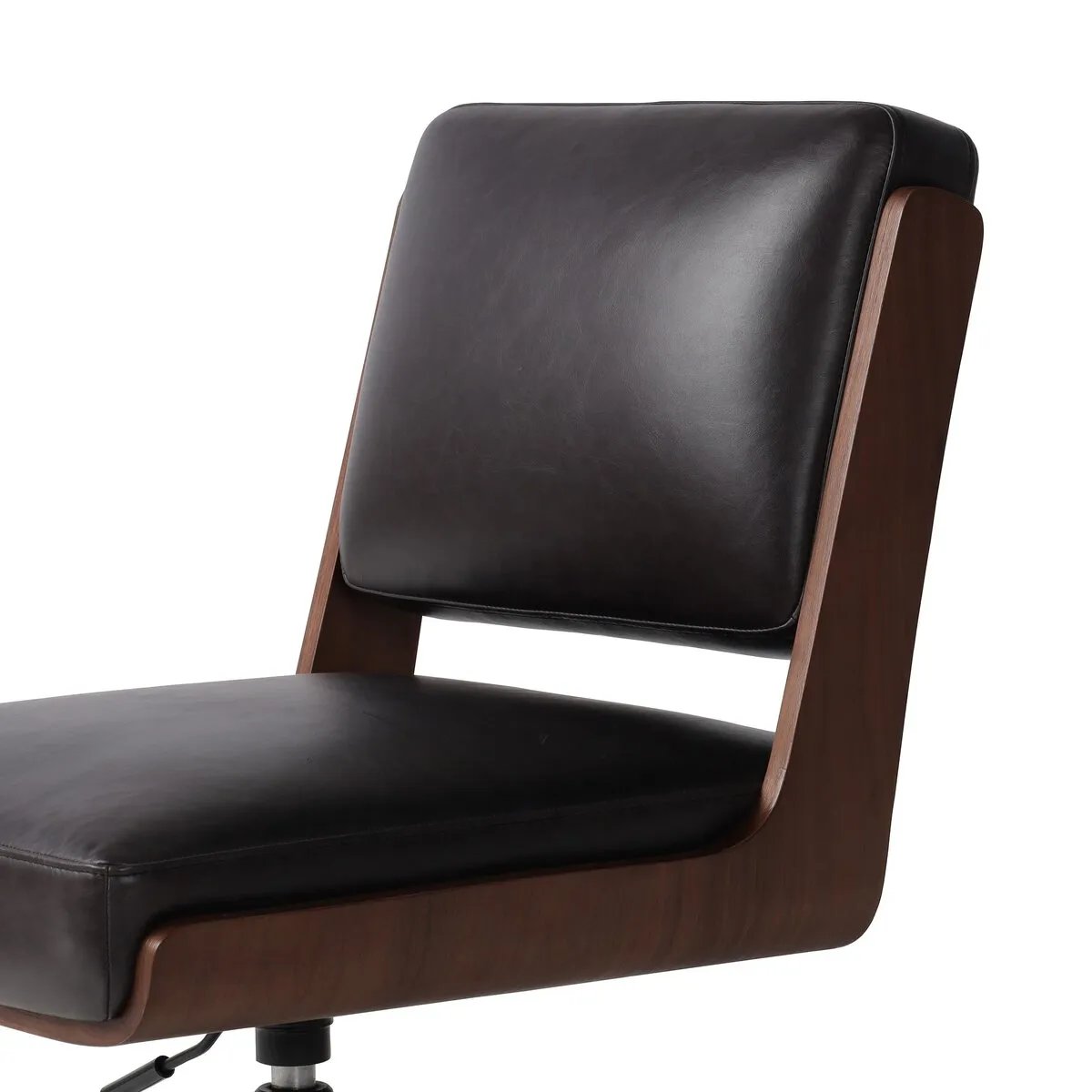 Featuring Landon Sonoma Black Armless Desk Chair by Four Hands at Amethyst Home. A nod to midcentury design, a molded wood frame veneered in rich walnut is paired with black top-grain leather cushions for maximum comfort. Height adjustable and 360-degree swivel function for ease in the workplace.
Overall Dimensions: 26.75" L x 20.5 " W x 34.0" H
Materials: . Amethyst Home provides interior design, new home construction design consulting, vintage area rugs, and lighting in the Charlotte metro area.