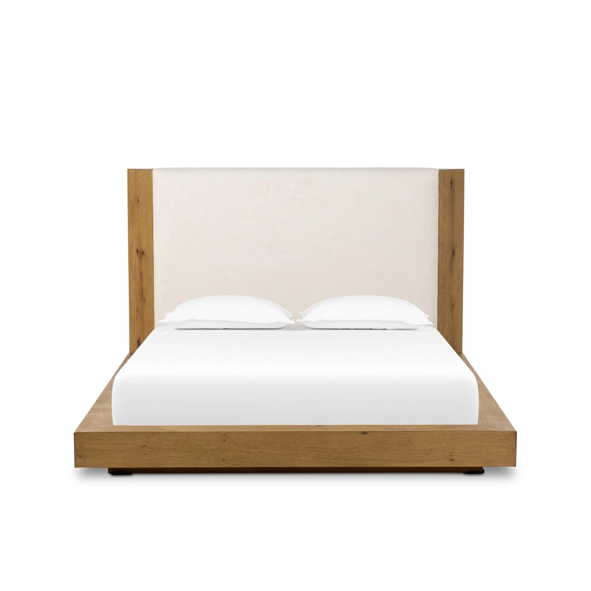 A woven, cushioned headboard in neutral cream adds texture around a floating platform base of light oak. Base features angular chamfered details, thick rails and footboard with a plinth base. Performance fabrics are specially created to withstand spills, stains, high traffic and wear, ensuring long-term comfort and unmatched durability Amethyst Home provides interior design, new home construction design consulting, vintage area rugs, and lighting in the Austin metro area.